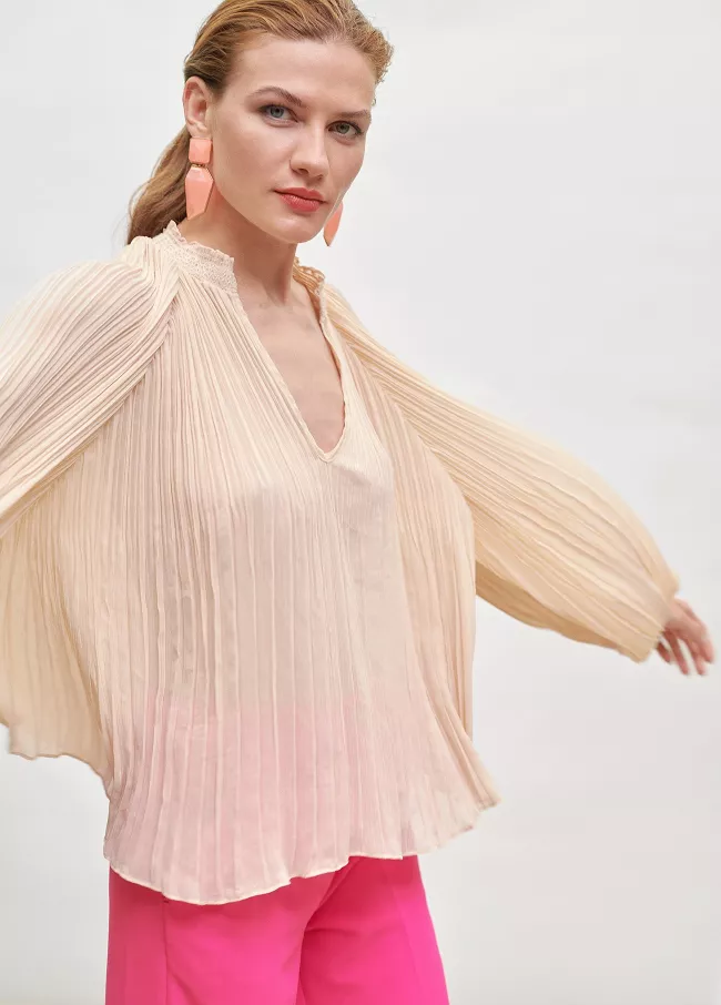 Blusa plisada