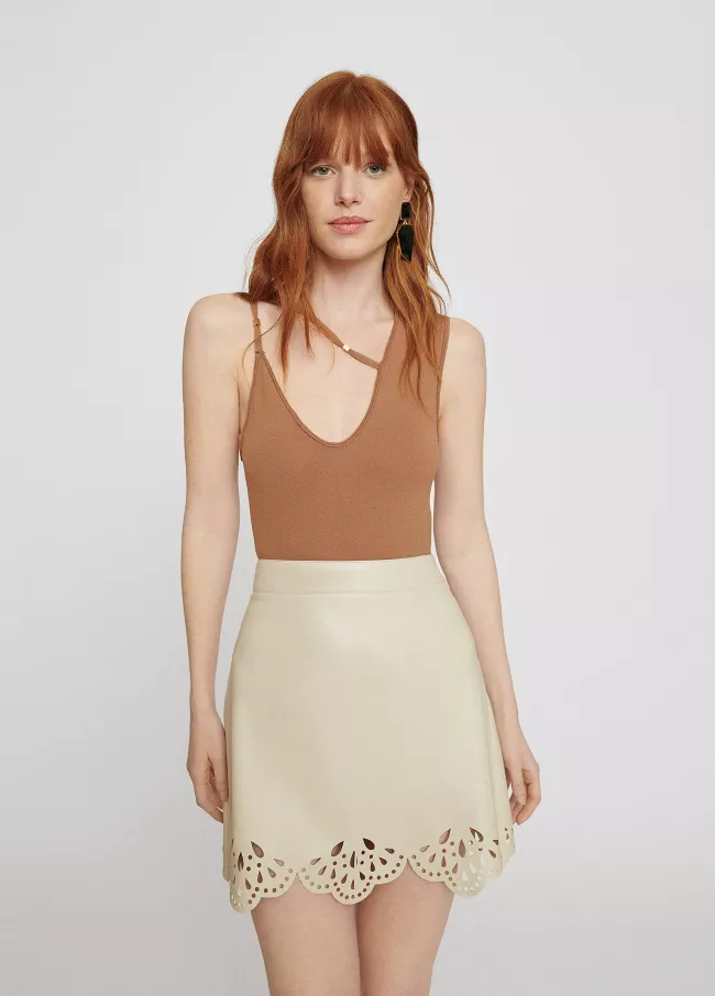Faux leather mini skirt with details