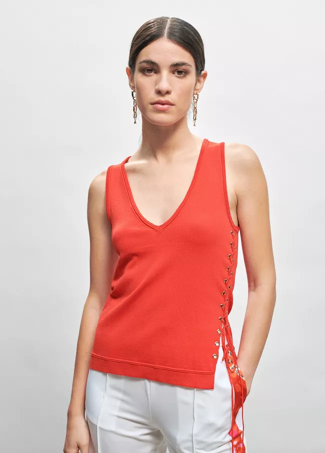 Top en maille détail œillets