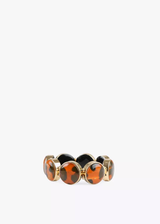 Bracelet élastique en pièces à imprimé a