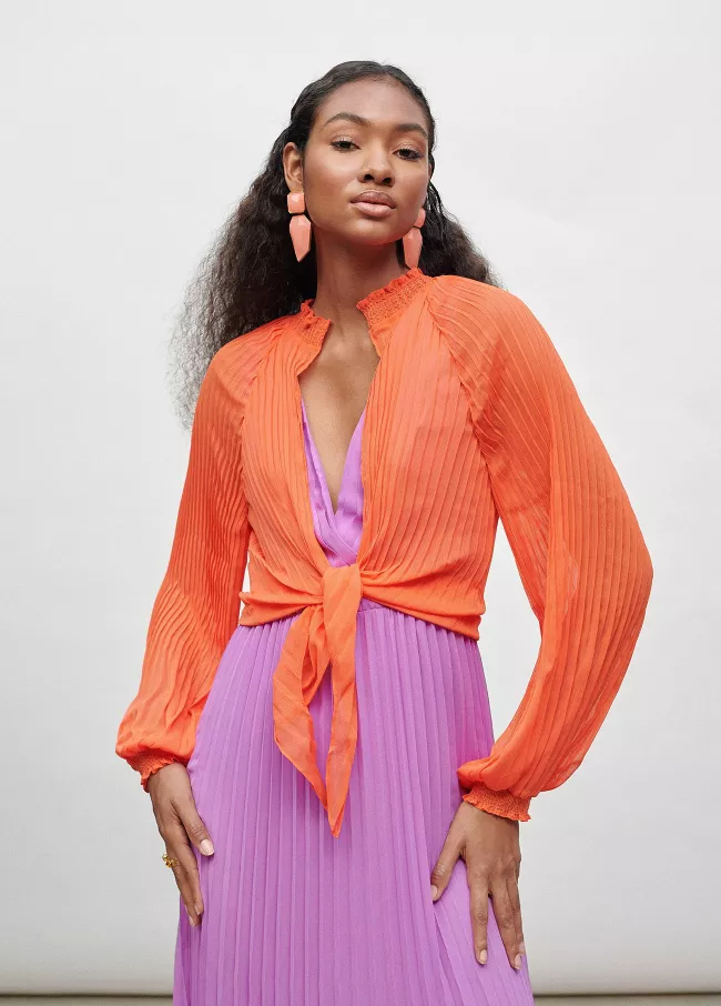 Bolero jacket with flowing knit sleeves