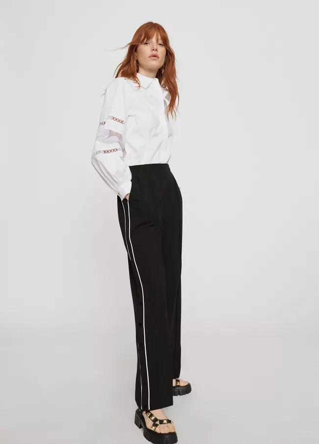 Pantalon fluide coloré avec passepoil