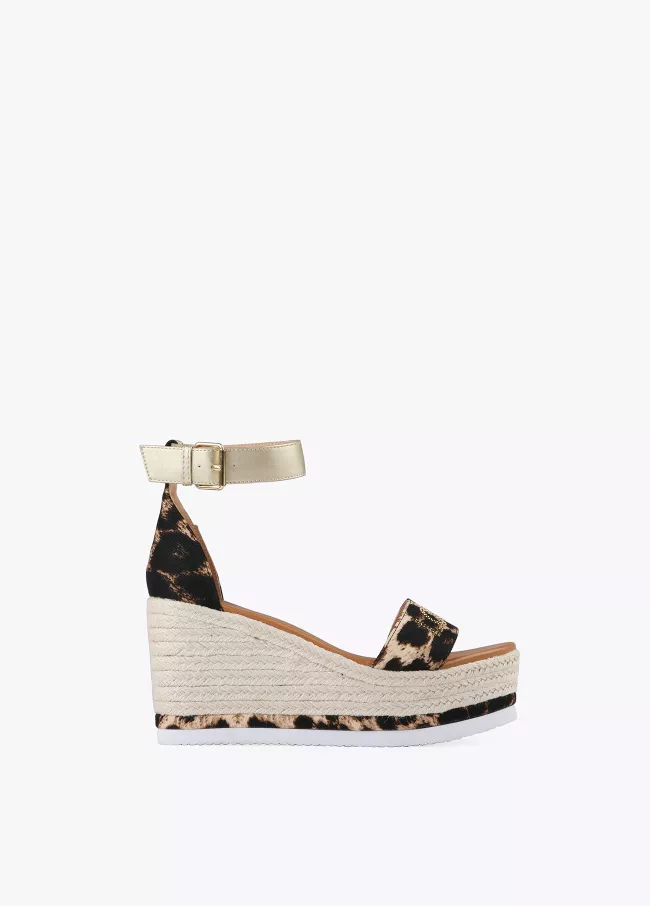 Keilabsatzsandalen mit Animal Print