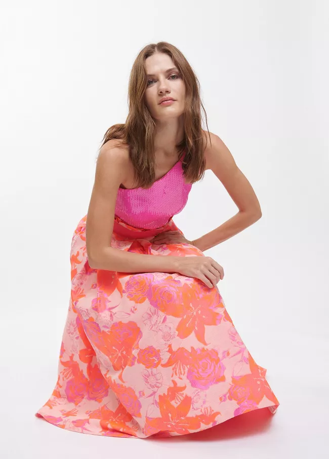 Sequinned top with one open shoulder