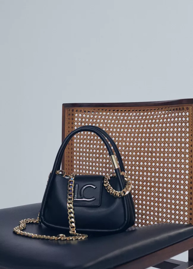 Mini crossbody bag with piping and logo