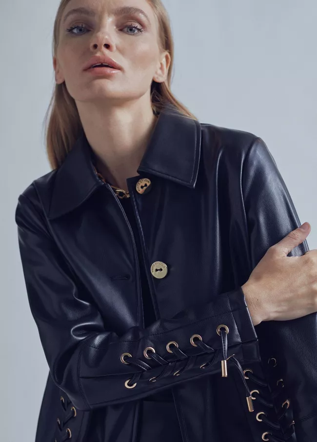 Chaqueta detalle piel eyelets
