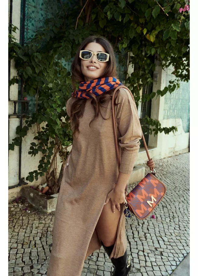Long sweater with a high collar and slit